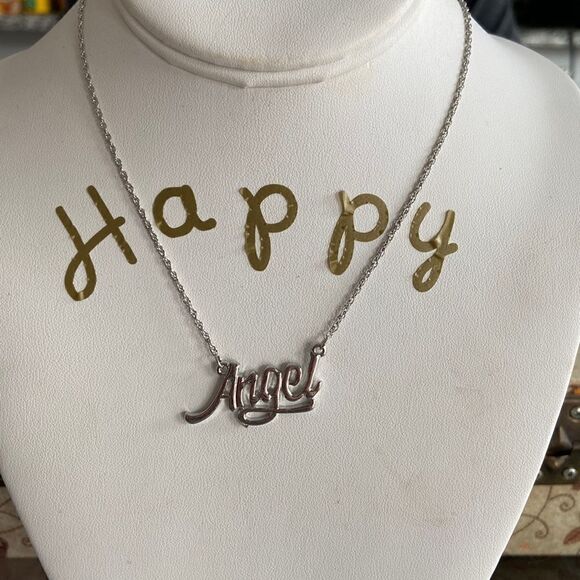 Calvin Klein Jewelry - Calvin Klein Necklace ANGEL written silver plated NWT